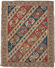 This finely woven Soumak was woven in the Kuba region of the eastern Caucasus during the late 19th century.&nbsp;

The field is composed of dynamic diagonal bands filled with stylized zoomorphic and geometric motifs that are often interpreted as abstract dragons and set against alternating red, ivory, and blue grounds. These bands are interspersed with charming and symbolic filler elements like tiny birds and floral motifs that animate the composition with delightful irregularity.