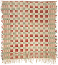 Overshot American Coverlet a grid of squares that utilize red and green wefts over an exposed white warp to create various patterns including stripes, diamonds and snowflakes. The grid is surrounded by a border of thin patterning on three sides. The top unbordered section is seamed with cloth indicating the original coverlet was likely longer.The addition of borders showcase the weaver's proficiency and skill. Fine weaving and wonderful contrast give this a crisp feel and eye dazzling visual effect.