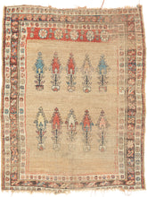 A rare and evocative Kurdish weaving that was likely woven in as a Sufi meditation mat. The design centers around an open camel-hair field punctuated by two registers of stylized cypress or tree-of-life motifs, symbolizing spiritual ascent and resilience.&nbsp;A single red vertical stripe flanking one edge subtly functions as a mihrab, orienting the user without the overt architecture of a classic prayer rug. This quiet asymmetry and spiritual intention suggest a meditative or mystical use, likely in a Sufi