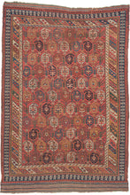 19th century It features a field of scrolling vines topped with wide blossoming botehs red, stark white, navy, indigo, and a desirable golden yellow on a red ground. It is surrounded by borders of bent ribbons, diagonal stripes and most prominently a dinosaur-like primitive bird border. This group of Afshars is thought to be woven in the Aqta region and have taken their patterning from nearby Kerman shawls. Nicely finished with striped kilim skirt borders on the top and bottom.