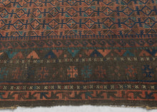 Afghan Baluch tight lattice design in earthy reds, browns, turquoise and apricot. Wide in the center but narrower on the top and bottom giving it a wonky charm. Finished with skirts of multicolor banded kilim on top and bottom.