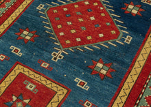 Fachralo Kazak bold contrasting color and open space to striking effect. Primary tones of red, yellow and blue and enhanced with the addition of turquoise and ivory. A simple pattern of rosettes and pinwheels evokes an abstract depiction of bees and flowers. Bees in the Caucasus can symbolize those who collect the 'honey' of traditional wisdom and preserve it for further generations. Top quality dyes to meaty wool to create a balanced and elegant rendering which provokes an emotional response.