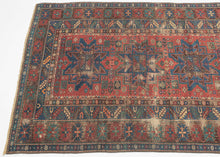 This Shirvan rug was woven in the Caucasus during the late 19th century.

It features three powerful leshgi stars on an earthy red ground full of various rosettes and protection symbols.&nbsp; Encapsulated by multiple individualized borders including rosettes, sunbursts, and calyx and serrated leaves. A very handsome palette of blues, reds, greens and aubergine is accentuated by glowing coral and orange among other tones.