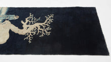 his Boatou rug was woven in Northern China during the early 20th century.

It features a nature scene in the style of classical Chinese landscape painting known as Shan Shui. The vertical composition of the rug invites the viewer to travel through the scene starting in the foreground and moving up to the tree and continuing to the night sky. Shan Shui painting has been described as an object for the viewer's mind as it endeavors to capture the emotions and rhythms of nature. Taoism