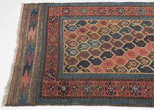 The field design is composed of alternating rows of botehs that aligned on the diagonal on a camel ground. The botehs are big and plump in contrasting tones of purples, blues and pinks including an early synthetic hot pink that isn't for Baluch purists but adds some visual interest for the rest of us!&nbsp; Finished on both ends with original interlocking lightning bolt kilims.