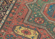 This striking piece is a masterclass in contrast—structural yet supple, bold yet intricate. Woven in the complex weft-wrapping technique characteristic of the Soumak tradition, it showcases a dynamic interplay of serrated medallions, latch-hook forms, and meandering vine motifs and stylized fauna.