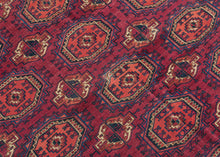 This Tekke Turkmen rug with Saryk aestetics was woven in Turkmenistan during the late 19th century.

It features a repeat field of octagonal main guls and cruciform minor guls on a richly colored &nbsp;plum ground. The back showcases Tekke sensibility, with tightly packed asymmetric knots, high warp depression, and deeply toned red wefting—all hallmarks of classic 19th-century Tekke craftsmanship. The borders are dense and harmonious, filled with geometric detailing and anchored by elegant guards. An elegan