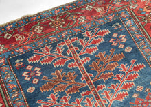 This unusual Karaja rug features&nbsp;a Tree of Life composition rendered in a vivid palette of indigo, madder, ivory, and soft terracotta tones. It combines the technical precision and geometric boldness typical of Karaja weavings with a spiritually resonant format more commonly associated with urban workshop rugs.