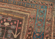 This Bakhshaish was handwoven during the 3rd quarter of the 20th century.

It is an exceptional and unusually square-format Bakhshaish rug, finely woven and boldly composed. Rather than the typical medallion or open-field layout, this piece features a dynamic tree-of-life design of stylized floral shrubs that rise in symmetrical rows from potted vases. Rendered in lively tones of rose, sky blue, saffron, and pistachio against a deeply oxidized walnut-brown ground.

The drawing is lyrical and expressive, wit