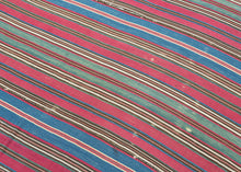 19th century Shahsavan silk jajim.This type of weaving was utilized as a bedding cover by nomads or in a village setting. This piece features rich, deeply saturated tones in bands of red, blue, yellow, green, ivory, and brown woven in a very fine silk. Warpface woven in multiple strips that have been sewn together. A collector's piece with exceptional dyes and materiality that is all about COLOR. A powerful piece that would be very impactful hung on the wall.