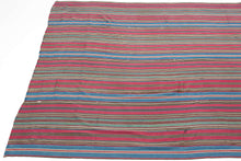 19th century Shahsavan silk jajim.This type of weaving was utilized as a bedding cover by nomads or in a village setting. This piece features rich, deeply saturated tones in bands of red, blue, yellow, green, ivory, and brown woven in a very fine silk. Warpface woven in multiple strips that have been sewn together. A collector's piece with exceptional dyes and materiality that is all about COLOR. A powerful piece that would be very impactful hung on the wall.