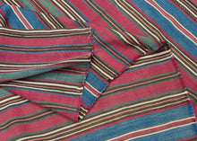 19th century Shahsavan silk jajim.This type of weaving was utilized as a bedding cover by nomads or in a village setting. This piece features rich, deeply saturated tones in bands of red, blue, yellow, green, ivory, and brown woven in a very fine silk. Warpface woven in multiple strips that have been sewn together. A collector's piece with exceptional dyes and materiality that is all about COLOR. A powerful piece that would be very impactful hung on the wall.