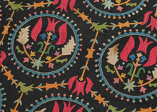 This embroidered textile is a well-preserved example of late Ottoman Armenian domestic needlework, likely produced in the town of Marash (modern-day Kahramanmaraş, Turkey) at the turn of the 20th century. &nbsp;

The embroidery is executed in silk floss using satin and couching stitches across a black cotton ground.&nbsp; It features concentric floral medallions, stylized birds and serrated leaves in lively blues, greens, red, pink, purple, yellow and ivory. Notably, two guardian-like anthropomorphic figure