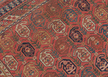 19th century It features a field of scrolling vines topped with wide blossoming botehs red, stark white, navy, indigo, and a desirable golden yellow on a red ground. It is surrounded by borders of bent ribbons, diagonal stripes and most prominently a dinosaur-like primitive bird border. This group of Afshars is thought to be woven in the Aqta region and have taken their patterning from nearby Kerman shawls. Nicely finished with striped kilim skirt borders on the top and bottom.