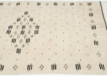 Saltillo serapes are typically celebrated for their explosive color and serrated diamonds, yet this example embodies a far rarer aesthetic restraint. Its monochrome palette highlights the quality of the hand-spun wool and gives the textile a modern presence that feels at home in both historical collections and contemporary interiors.


The graphic language here anticipates the design vocabulary that would later define Mexican modernism. The patterning resonates especially with the iconic Mexico City Olympic