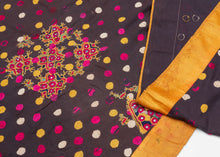 This vibrant ceremonial sari exemplifies the Rabari embroidery tradition of Gujarat. Worked on a lustrous silk ground, the field is covered in hand-embroidered satin-stitch dots in jewel tones of magenta, saffron, and ivory, echoing the region’s famed bandhani aesthetic. The richly decorated end panel features dense floral and geometric embroidery in silk floss threads, highlighted with mirror insets, symbolic of protection and celebration within Rabari culture. Such pieces were created as dowry or ceremoni