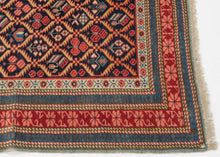 An exceptional example of the Seychour tradition, this runner stands out for the clarity of its drawing, crisp geometry, and refined palette. A tightly organized lattice of abstracted floral forms runs the full length of the field, each element articulated with precision and rhythm that feels both deliberate and energetic.