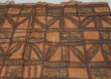 Siapo, the Samoan tradition of bark cloth, is closely tied to ceremony, exchange, and domestic life throughout Polynesia. These cloths were often made in large formats and decorated with repeating geometric designs drawn from natural, architectural, and ancestral forms. The patterning here has a strong architectural rhythm, with bands, rectangles, triangular forms, and dark filled passages arranged across the surface.