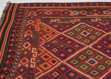 Mid-20th century Maimana kilim from northern Afghanistan with repeating diamond lattice motifs in red, blue, green, and saffron, framed by multiple geometric borders.