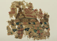 A wonderfully animated fragment of late antique Egyptian tapestry weaving, densely worked with stylized&nbsp;zoomorphic and vegetal forms with&nbsp;&nbsp;small geometric compartments in muted red, blue-green, rose, ochre, brown, and black.

The imagery is compressed into horizontal registers, with individual motifs appearing almost like tiny pictograms. Its fragmentary survival only heightens that quality, turning what was once part of a larger textile into an unexpectedly modern, almost collage-like compos