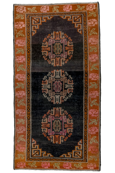 This rug features three orb-like Ay-gul or 