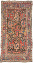 A confident&nbsp;Bidjar with a saturated red field and bold geometric medallion composition. Angular motifs in indigo, ivory, and saffron are crisply articulated, creating a dynamic interplay of symmetry and movement across the surface.