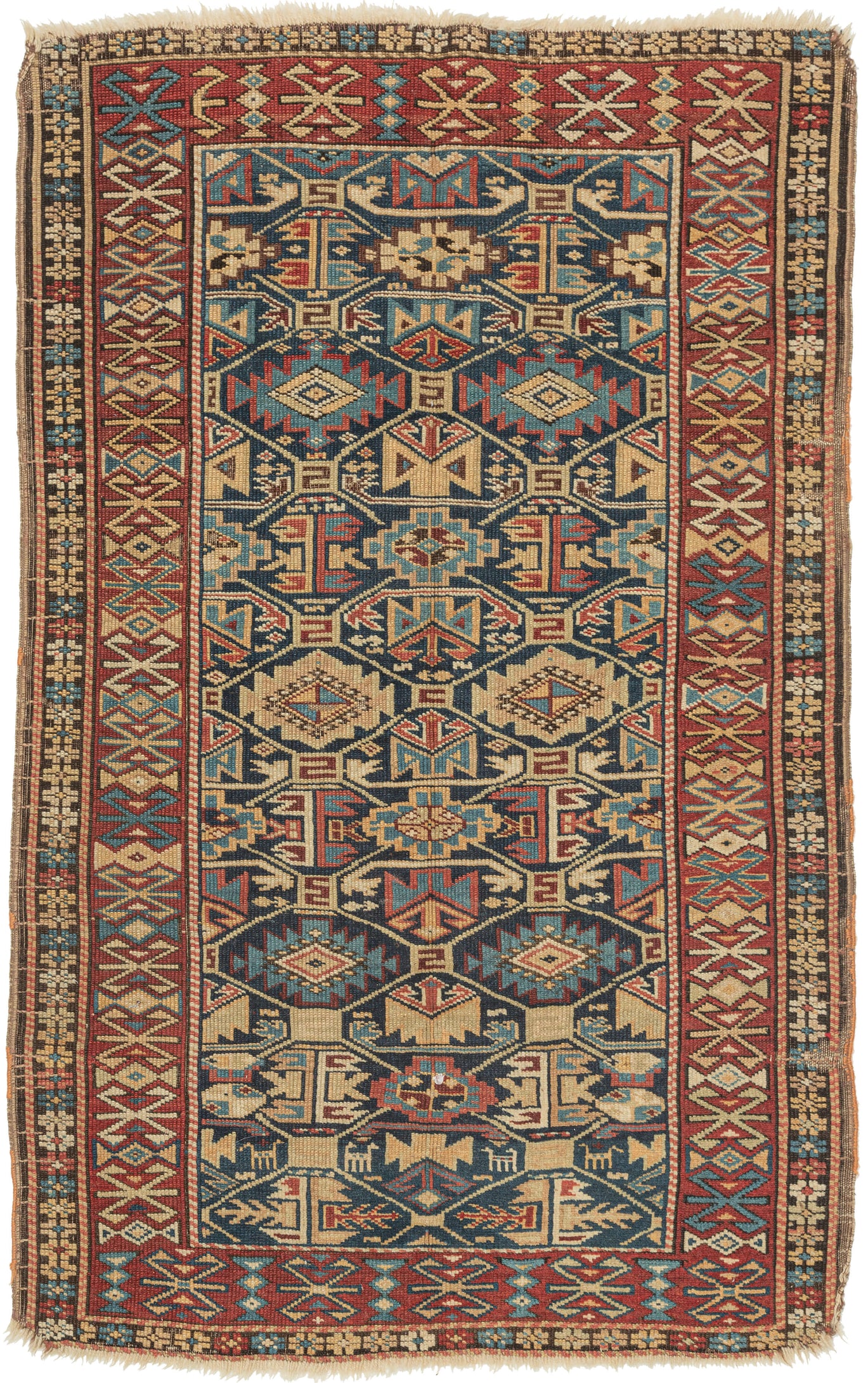 This rug was woven during the 19th century in Kuba district of the Northern Caucasus

It features an allover geometric lattice design against an indigo backdrop. A nicely spaced red ground main border provides the perfect contrast to the field. Four stylized animal figures can be seen near the bottom of the field.