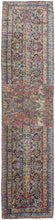 Manchester Keshan runner handwoven in C Iran during 1900-1925. The rug has been cut in the middle with an added panel. The design is composed of a complex curvilinear design typical of Keshan rugs. In fair condition, with wear throughout. Solid foundation.