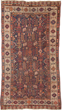 This Shekarlu rug was woven at the turn of the 20th century. The Shekarlu are a Lori-speaking tribe of the Qashqa'i Confederacy.

It features a spectacular all-over field chock full of totemic polygons, rosettes, serrated combs, and various types of animals and protection symbols. Nicely balanced yet yet still with a free flowing rhythm. It features reds, lively blues, sunny yellows, sage, brown and bright ivory on a indigo ground. The whole is framed by a stark white border