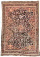 Farahan rug woven It features patterning that would usually be associated with Khamseh tribes further south but constructed in with all the hallmarks of Farahan weaving.  full of dozens of birds and multiple vase motifs. Framed by a main border meandering rosettes and botehs on a magenta ground and finished with skirt borders commonly associated Khamseh and Qashqa'i nomads. There are multiple instances of the ancient symbol of the lion holding a sword in front the sun