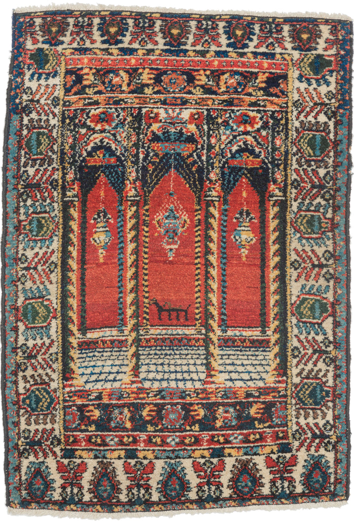 This Senneh rug was woven during the second quarter of the 20th Century.

Wonderful but still folky perspective of looking into a building with three arches each with a hanging lantern. The perspective is accentuated by a grid which runs into a columned platform before breaking off into the glowing red distance. The piece is further differentiated by the addition of a zoomorphic alter directly in the center.