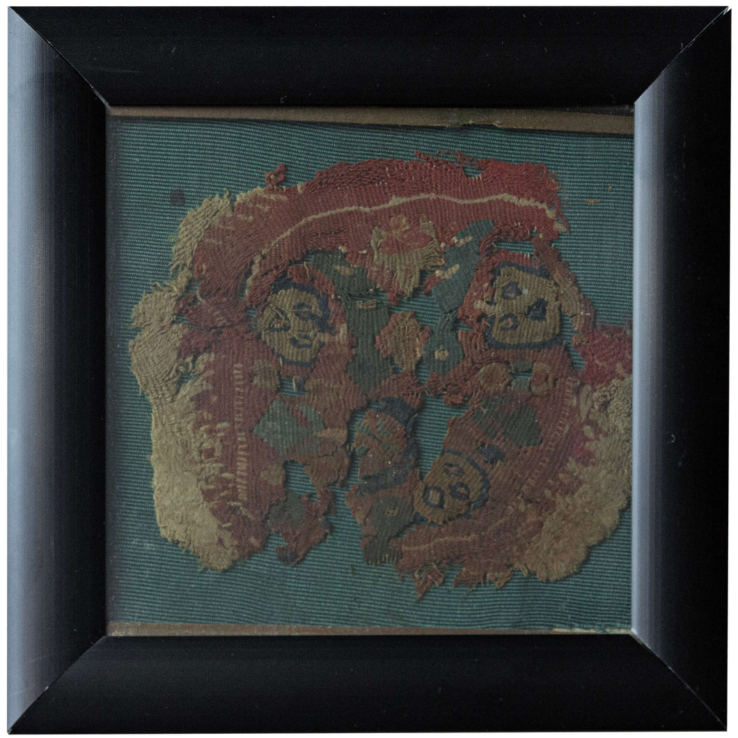 This Coptic textile was woven in Egypt or the Levant during the 6th-7th century AD.&nbsp;

It features a roundel with various faces and vegetal motifs on a earthy red ground. It is framed by rounded borders including a main latchhooked border. With tones of green, purple and yellow to go with the wheat colored linen classically found in these textiles.&nbsp;