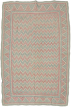 A finely worked Lahori kantha from the Rajshahi region of Bangladesh, densely embroidered in running stitch with alternating bands of faded red and soft blue. The name Lahori or Lohori is generally associated with lahar or lehar, meaning “wave,” a fitting description for the rhythmic movement created by its repeated geometric stitching.