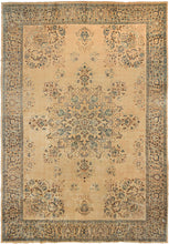 This Meshed was woven during the second quarter of the 20th century.  It features an ornate floral firework of a central medallion and with four overflowing vase cornices and various small floral sprays on an expansive sandy ground. The pattern is rendered in a soft palette of indigo, seafoam, lilac, hickory and ivory. Framed by an intricate border of palmettes on the same soft sand ground. Elegant yet unpretentious.