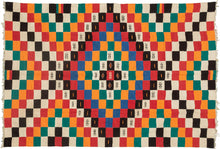 This blanket was likely woven by the Fulani people in Mali during the middle of the 20th century.

It was woven in multiple stripes which have been attached horizontally. It features an eye dazzling checkerboard composed of white, black, red, green, blue and a sunny yellow-orange. Four individual squares around the perimeter are woven with the red-yellow-green tricolor of the Malian flag.

Via The Metropolitan Museum of Art The checkerboard, a basic West African composition, ultimately may derive from