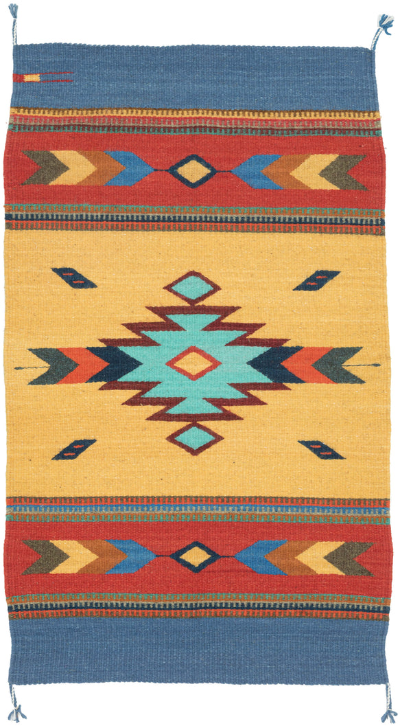 A bright contemporary Oaxacan flatwoven rug by Zapotec weavers from Teotitlán del Valle, Oaxaca. The design features a warm yellow field with a central stepped diamond medallion in turquoise and burgundy, framed by red border bands and deep blue end panels.