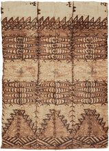 This Tapa or Ngatu cloth was made of mulberry bark fiber in Tonga during the 20th century.

Tapa or Ngatu in Tonga is a type of decorated barkcloth found throughout Polynesia. The inner bark of the paper mulberry tree is beaten with a mallet and joined into a large cloth which is then decorated with natural dyes and pigments. The decoration is called Kupesi and references the natural world, seasons and Tongan cosmology.