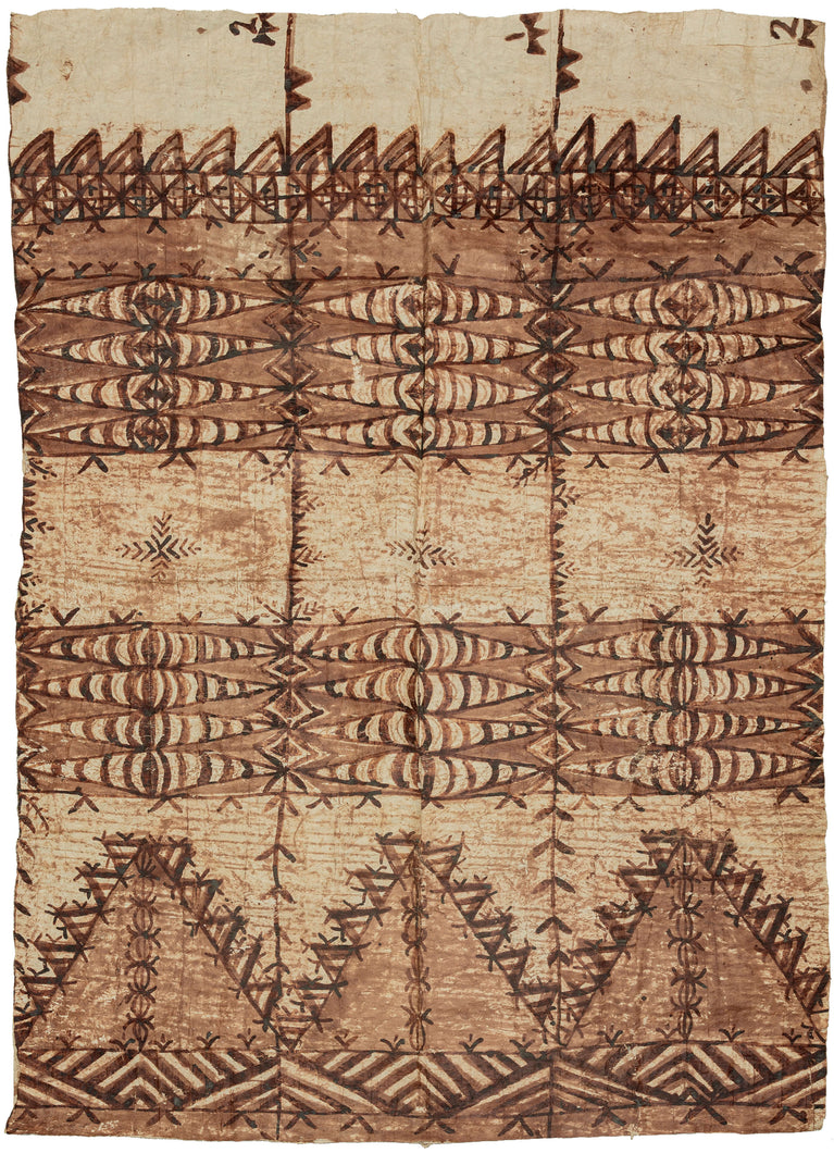 This Tapa or Ngatu cloth was made of mulberry bark fiber in Tonga during the 20th century.

Tapa or Ngatu in Tonga is a type of decorated barkcloth found throughout Polynesia. The inner bark of the paper mulberry tree is beaten with a mallet and joined into a large cloth which is then decorated with natural dyes and pigments. The decoration is called Kupesi and references the natural world, seasons and Tongan cosmology.