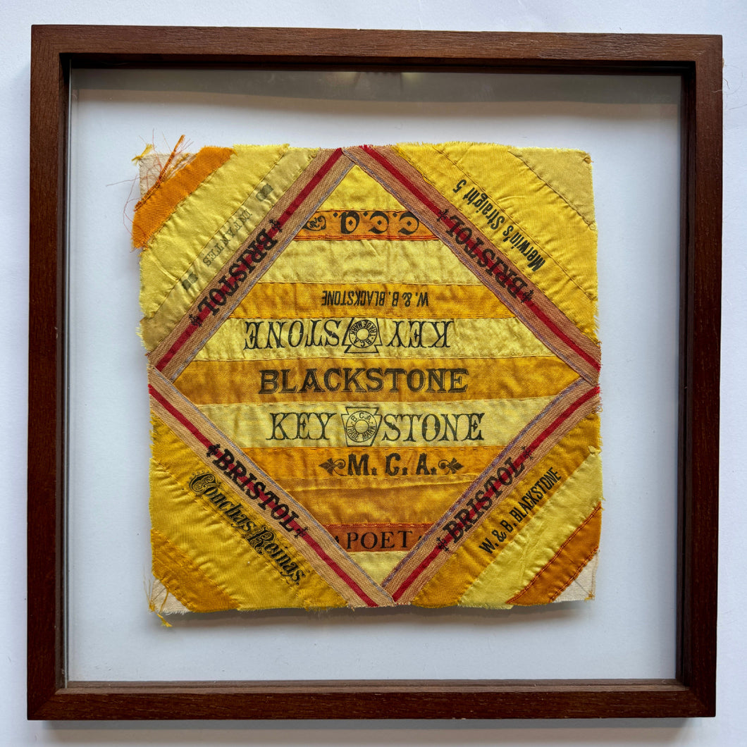 This quilts were handcrafted in United States during the turn of the 20th century.

These hand-stitched quilt panels are made from silk cigar ribbons. These pieces reflect a unique chapter in American domestic craft, when women repurposed decorative silk bands that had been used to bundle cigars into quilts, pillows and other textile art. The brand names, including Harvard, Blackstone, and Londres Extra, are framed in bold type and bright tones of yellow and orange, capturing the visual language of turn-l o
