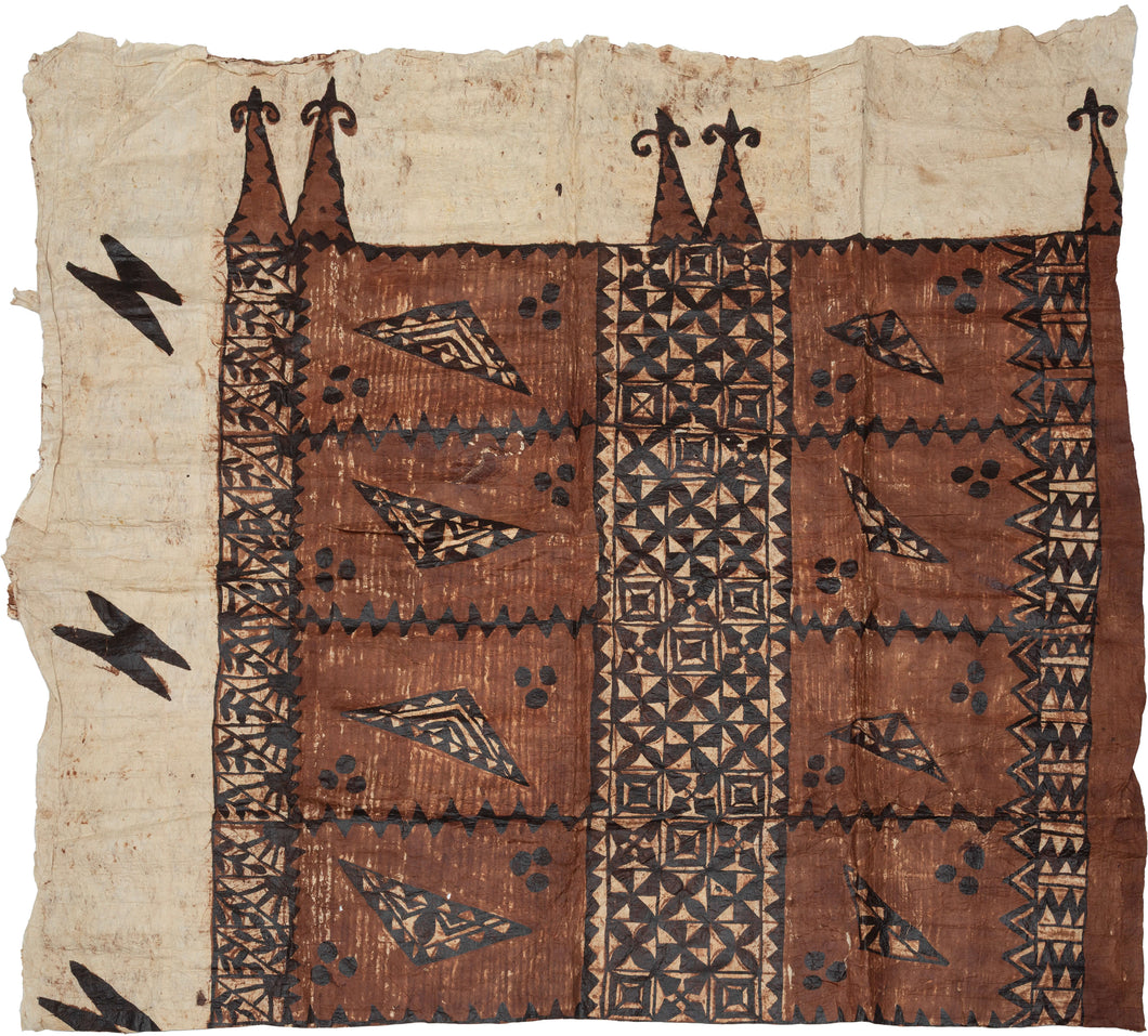 A large Tongan&nbsp;barkcloth decorated with bold geometric and figural motifs in deep brown and black natural dyes. The central field is organized in panels of repeating triangular forms and small clustered dots, framed by intricate borders of interlocking patterns that create strong graphic contrast against the lighter ground.