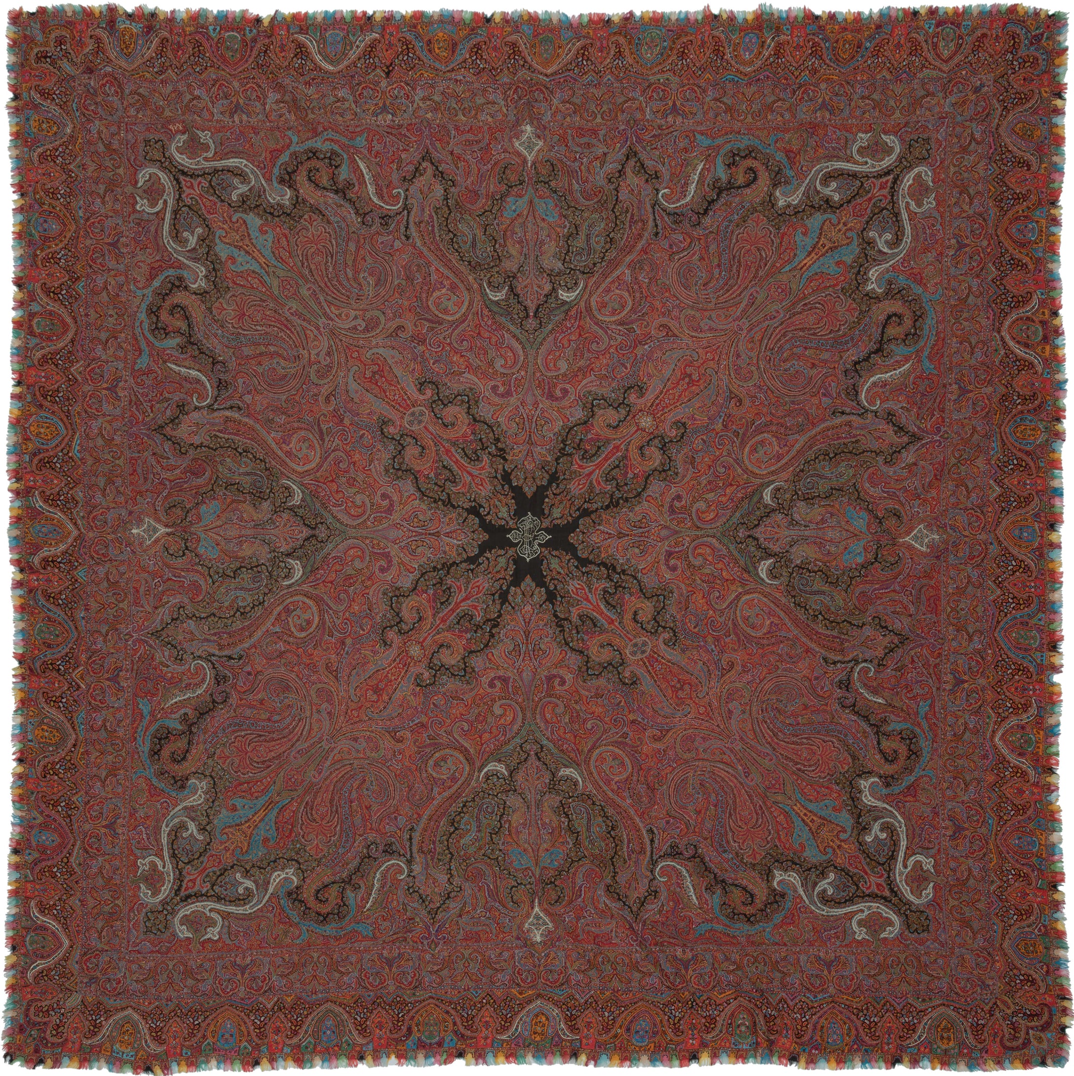 19th century square Kashmir kani shawl with dense red boteh (paisley) design, joined panel construction, and a central woven inscription cartouche in stylized Persian script, with intricate borders and multicolor fringe.