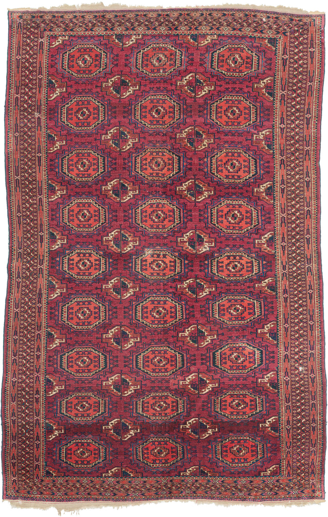 This Saryk turkmen aestetics was woven in Turkmenistan during the late 19th century.

It features a repeat field of octagonal main guls and cruciform minor guls on a richly colored  plum ground. The back showcases Tekke sensibility, with tightly packed asymmetric knots, high warp depression, and deeply toned red wefting—all hallmarks of classic 19th-century Tekke craftsmanship. The borders are dense and harmonious, filled with geometric detailing and anchored by elegant guards. 