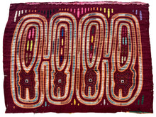 Vintage Mola cloth handmade by the Guna (previously spelled Kuna) people of the San Blas Islands.  Mola is a reverse appliqué technique, similar to the technique used in quilting but&nbsp;using multiple layers of different-colored cloth that are first sewn together before a design is created by cutting away different layers. These cloths are traditionally made in pairs to be worn on the front and back of women's blouses.  This Mola features four abstracted crocodiles.