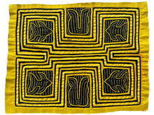 Vintage Mola cloth handmade by the Guna (previously spelled Kuna) people of the San Blas Islands.  Mola is a reverse appliqué technique, similar to the technique used in quilting but&nbsp;using multiple layers of different-colored cloth that are first sewn together before a design is created by cutting away different layers. These cloths are traditionally made in pairs to be worn on the front and back of women's blouses.  This Mola features four fish and what are likely sea plants on a yellow ground. 