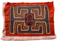 Vintage Mola cloth handmade by the Guna (previously spelled Kuna) people of the San Blas Islands.  Mola is a reverse appliqué technique, similar to the technique used in quilting but&nbsp;using multiple layers of different-colored cloth that are first sewn together before a design is created by cutting away different layers. These cloths are traditionally made in pairs to be worn on the front and back of women's blouses.  This Mola features a vertical fish