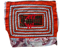 Vintage Mola cloth handmade by the Guna (previously spelled Kuna) people of the San Blas Islands.  Mola is a reverse appliqué technique, similar to the technique used in quilting but&nbsp;using multiple layers of different-colored cloth that are first sewn together before a design is created by cutting away different layers. These cloths are traditionally made in pairs to be worn on the front and back of women's blouses.  This Mola features a central lobster motif.  