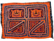 Vintage Mola cloth handmade by the Guna (previously spelled Kuna) people of the San Blas Islands.  Mola is a reverse appliqué technique, similar to the technique used in quilting but&nbsp;using multiple layers of different-colored cloth that are first sewn together before a design is created by cutting away different layers. These cloths are traditionally made in pairs to be worn on the front and back of women's blouses.  This Mola features two orange cats. 