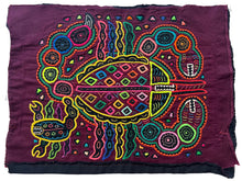 Vintage Mola cloth handmade by the Guna (previously spelled Kuna) people of the San Blas Islands.  Mola is a reverse appliqué technique, similar to the technique used in quilting but&nbsp;using multiple layers of different-colored cloth that are first sewn together before a design is created by cutting away different layers. These cloths are traditionally made in pairs to be worn on the front and back of women's blouses.  This Mola features two scorpions, one small and one large.