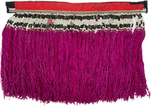 A rare traditional back collar from the Dao Hồng Tụ community of Yên Bái, in the northern highlands of Vietnam. Made as a detachable costume element, this richly ornamented panel would have been worn over a tunic, forming a highly visible expression of Dao identity, artistry, and regional dress tradition.

The collar is constructed with appliquéd red, black, and white cotton, creating a bold geometric band across the top. Rows of antique glass beads are carefully arranged in black and white, with small colo