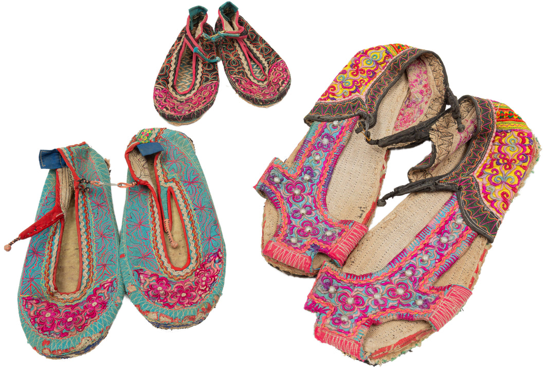 A rare set of embroidered shoes from the Xa Phang people of Dien Bien province in northern Vietnam, including examples for a man, woman, and child. Each pair is constructed with layered textile soles and richly worked uppers, decorated with vivid embroidery in pink, red, green, yellow, blue, and black.

Xa Phang women are known for their highly skilled textile work, and embroidered shoes are among the most expressive parts of traditional dress. The designs follow the community’s established visual vocabular